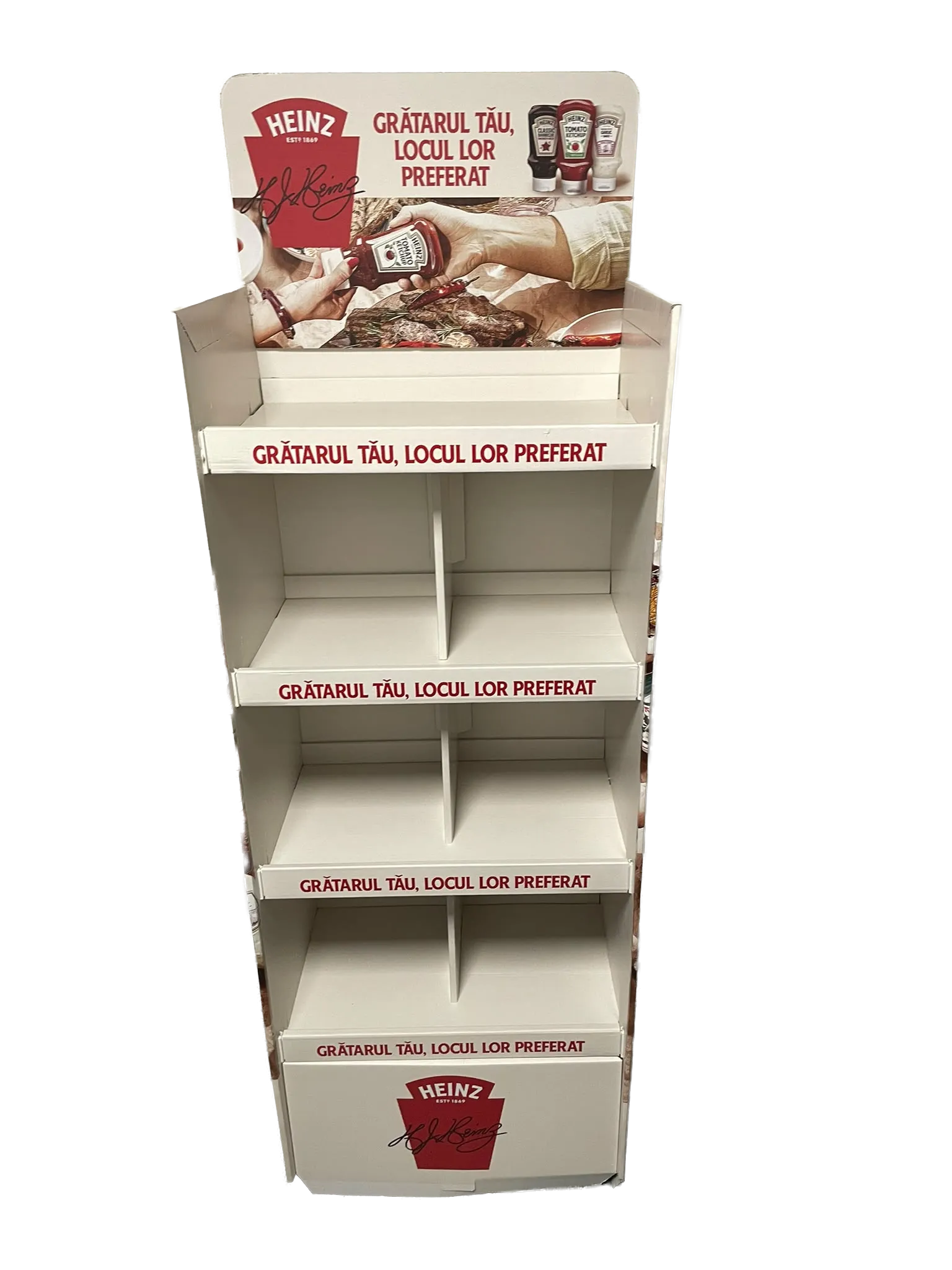 Display podea Heinz pentru sosuri, alb cu accente roșii, ilustrând produse și scenă de grătar.